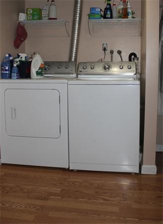 29 Cogger Road Lowell, MA 01854 - Photo 22 of 24 a view of kitchen island with wooden floor