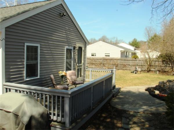 29 Cogger Road Lowell, MA 01854 - Photo 23 of 24 a view of a balcony with chair and wooden floor