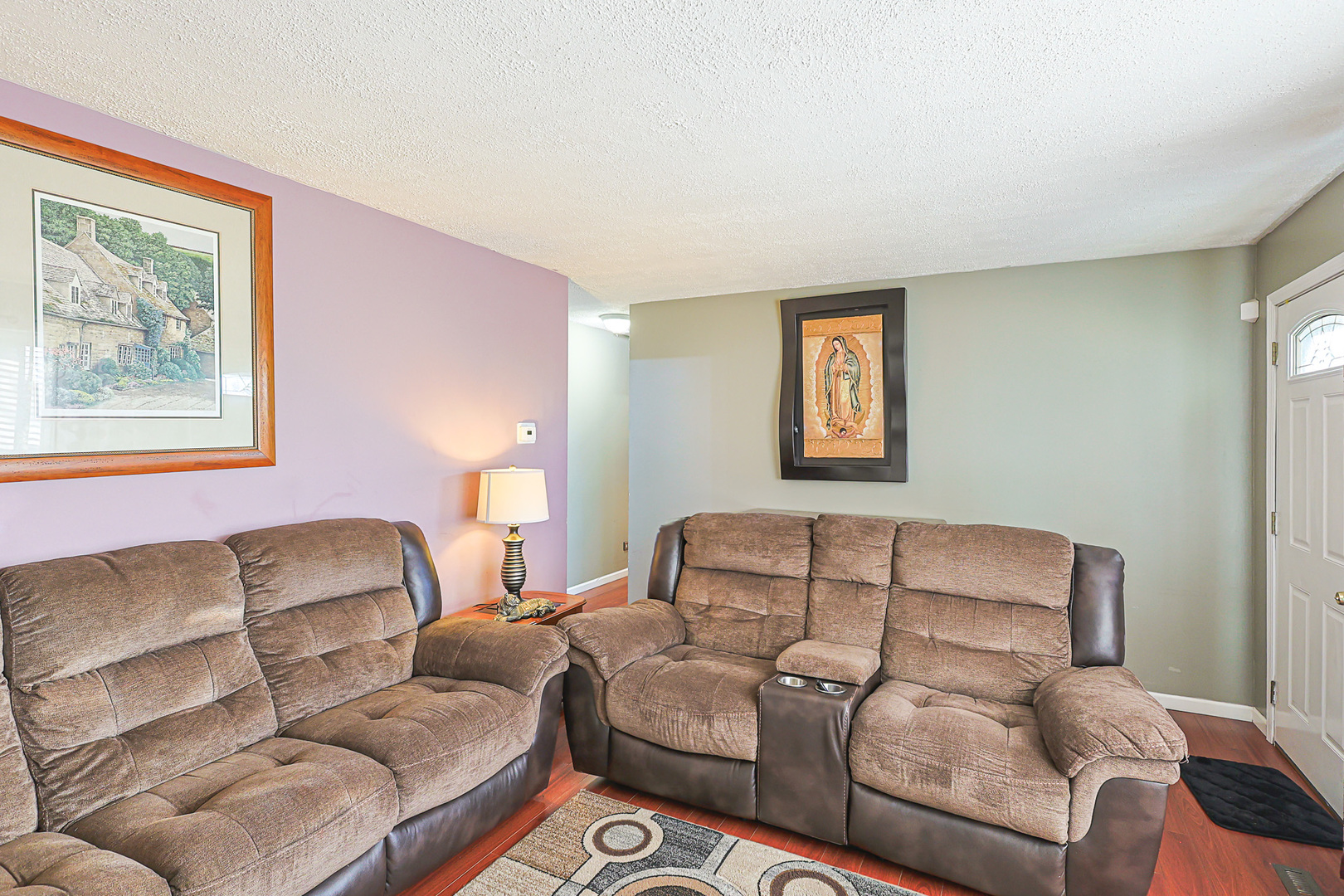 1501 Pawnee Road Carpentersville, IL 60110 - Photo 18 of 22 a bed room with couch and a window