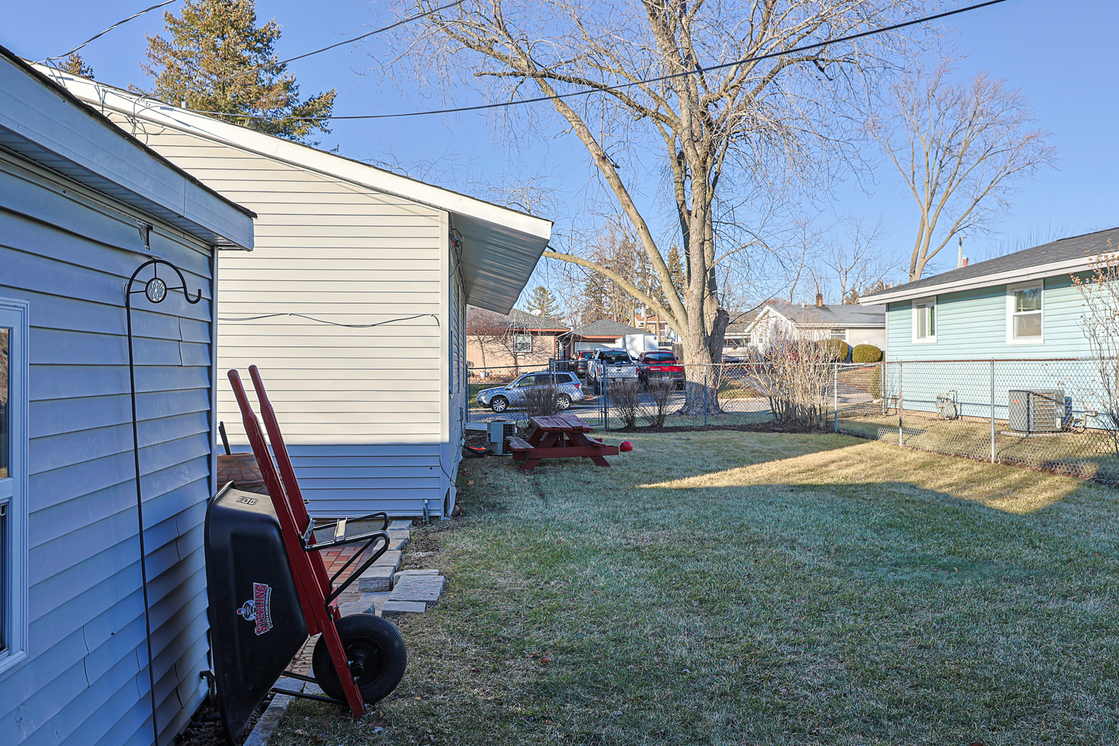 1501 Pawnee Road Carpentersville, IL 60110 - Photo 8 of 22 a view of backyard with deck and seating area