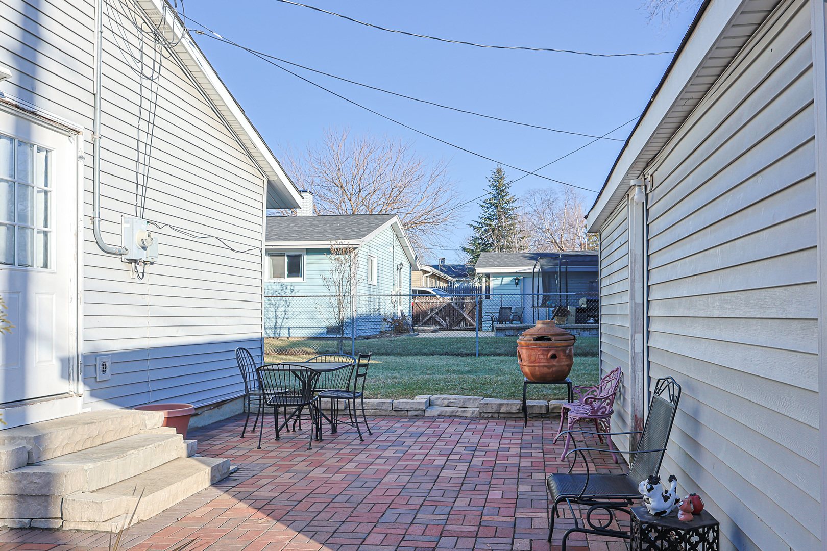 1501 Pawnee Road Carpentersville, IL 60110 - Photo 10 of 22 a view of backyard with sitting area