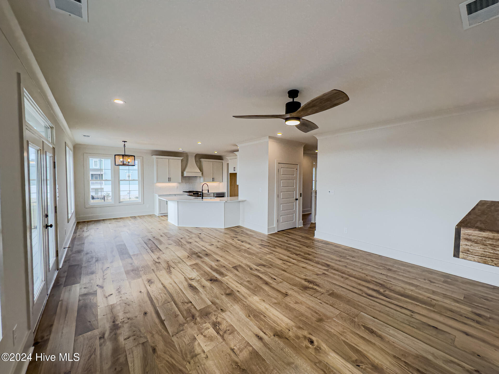 209 Colleton Square Newport, NC 28570 - Photo 7 of 33 Living Room to Casual Dining/Kitchen