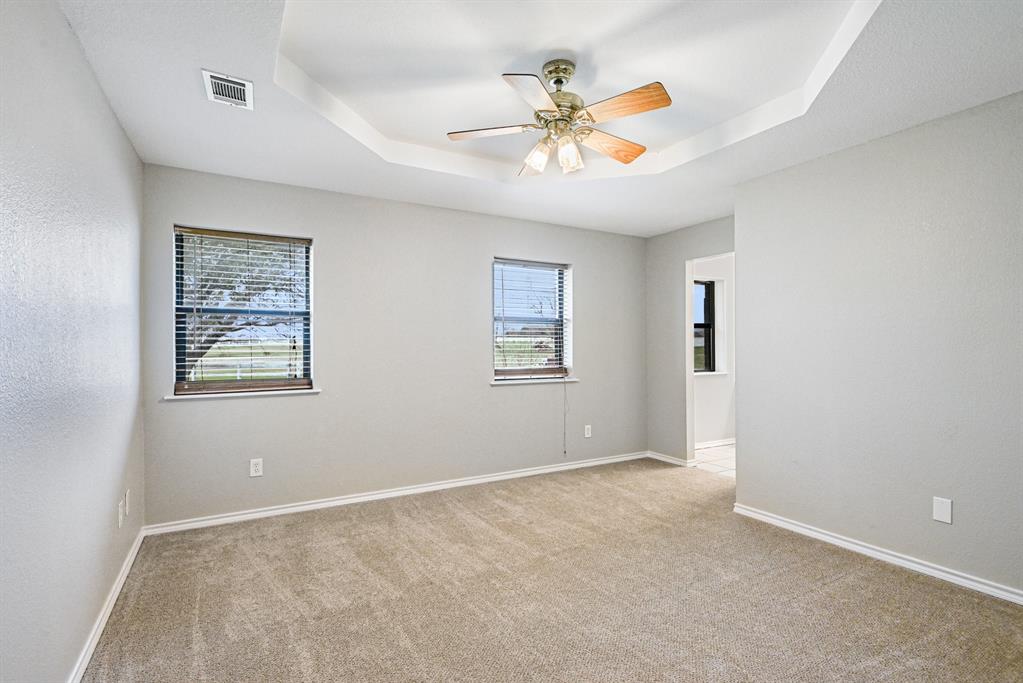 10101 Round Hill Road Fort Worth, TX 76131 - Photo 15 of 30 a view of an empty room with a window
