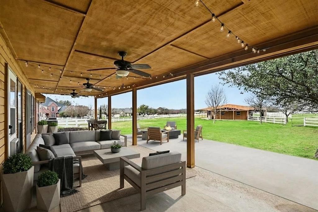 10101 Round Hill Road Fort Worth, TX 76131 - Photo 25 of 30 a building outdoor space with patio furniture and garden