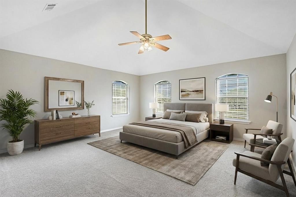 10101 Round Hill Road Fort Worth, TX 76131 - Photo 10 of 30 a spacious bedroom with a bed and a couch