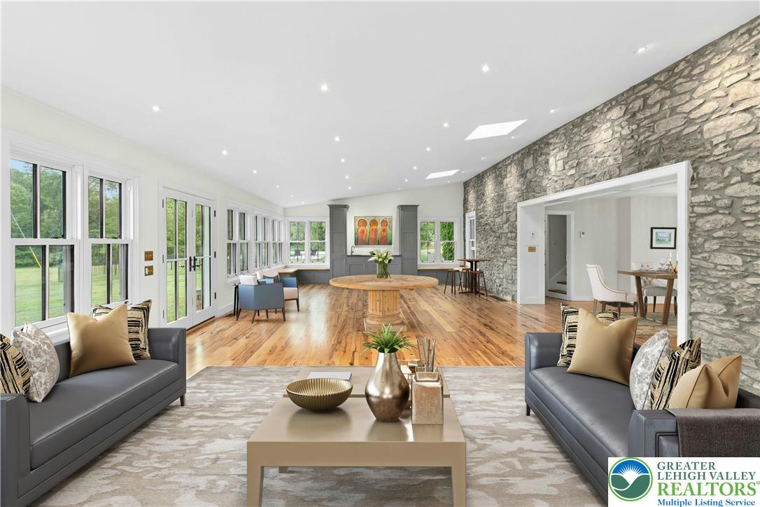 119 Center Hill Road Upper Black Eddy, PA 18972 - Photo 12 of 63 a living room with furniture and a large window