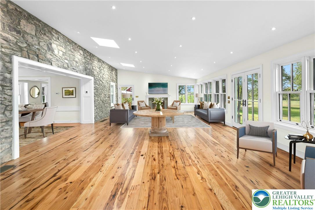 119 Center Hill Road Upper Black Eddy, PA 18972 - Photo 13 of 63 a living room with furniture and a wooden floor