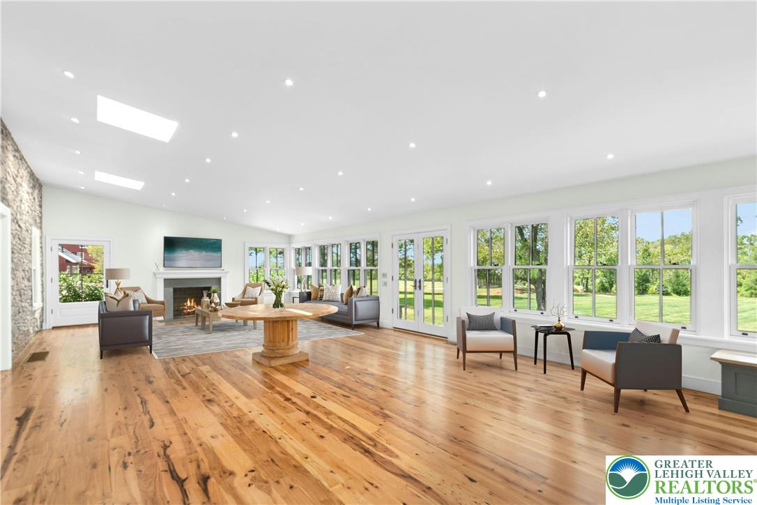 119 Center Hill Road Upper Black Eddy, PA 18972 - Photo 14 of 63 a living room with furniture and a wooden floor