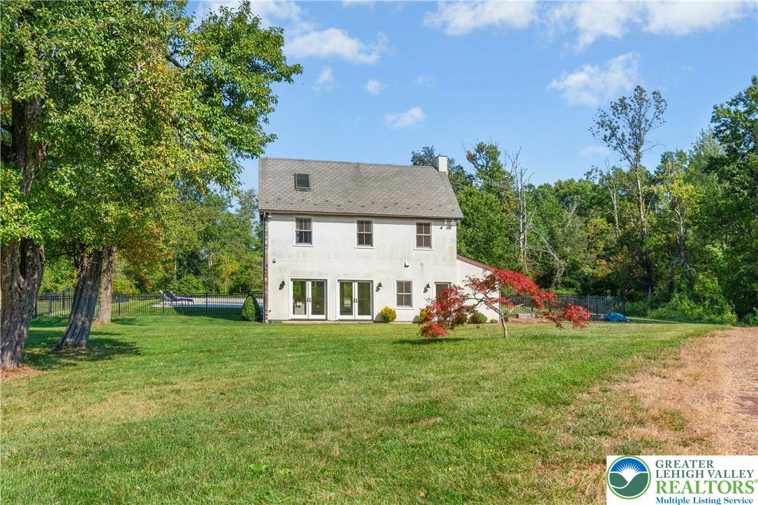 119 Center Hill Road Upper Black Eddy, PA 18972 - Photo 23 of 63 a view of a house with a yard and trees