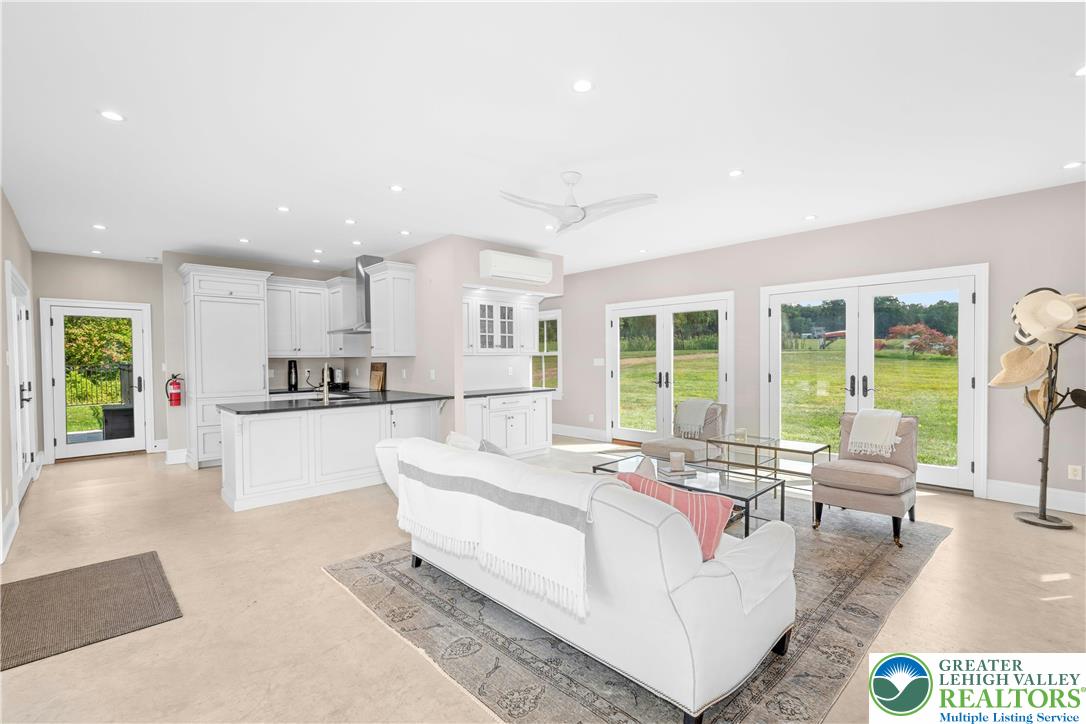 119 Center Hill Road Upper Black Eddy, PA 18972 - Photo 26 of 63 a living room with stainless steel appliances granite countertop furniture and a couch