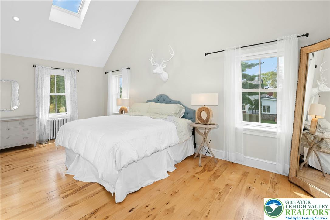 119 Center Hill Road Upper Black Eddy, PA 18972 - Photo 31 of 63 a bedroom with a bed and a window