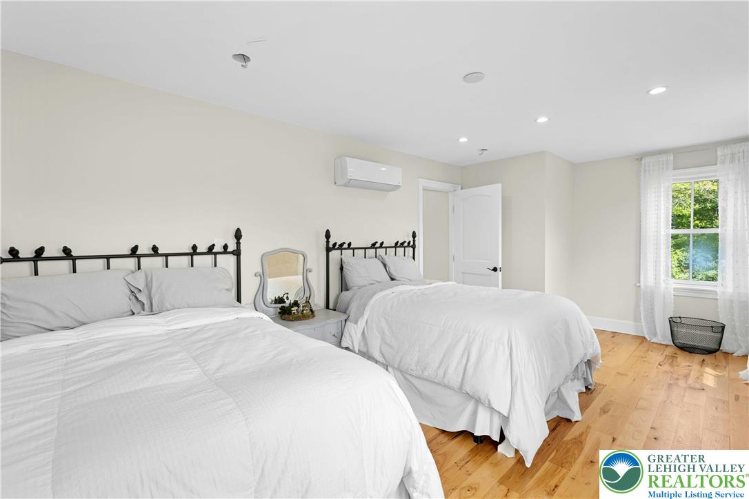 119 Center Hill Road Upper Black Eddy, PA 18972 - Photo 32 of 63 a bedroom with two beds and painted walls