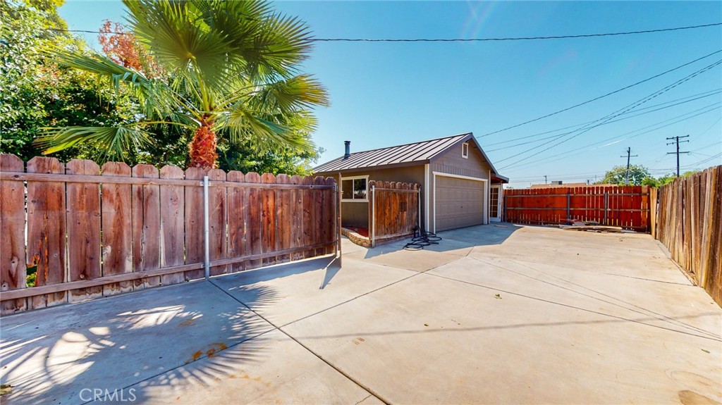 218 7th Street Orland, CA 95963 - Photo 31 of 38 Back area fenced behind backyard & off alley extra parking, patio or play area