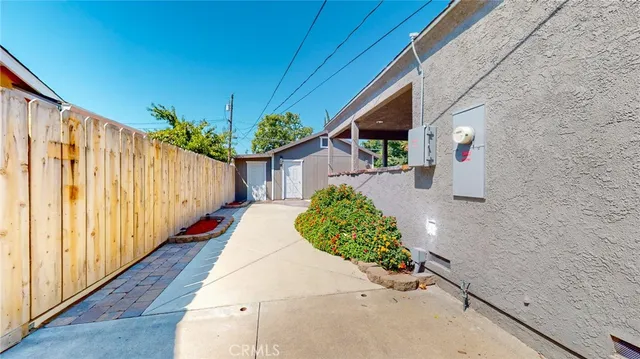 a view of a house with a street