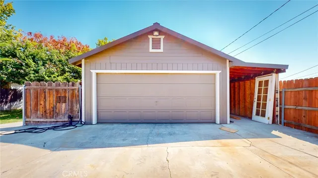 a front view of a house with garage