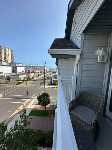 a view of a street with sitting area