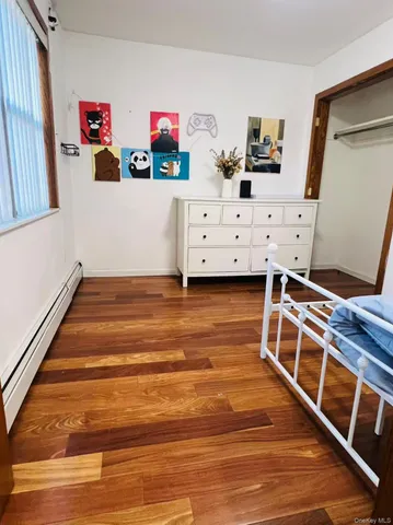 a room with furniture and white walls