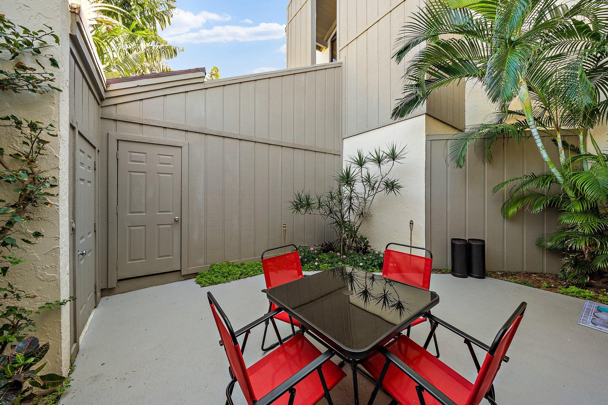 1605 Highway 1, Unit SL5A Jupiter, FL 33477 - Photo 7 of 26 an outdoor space with furniture