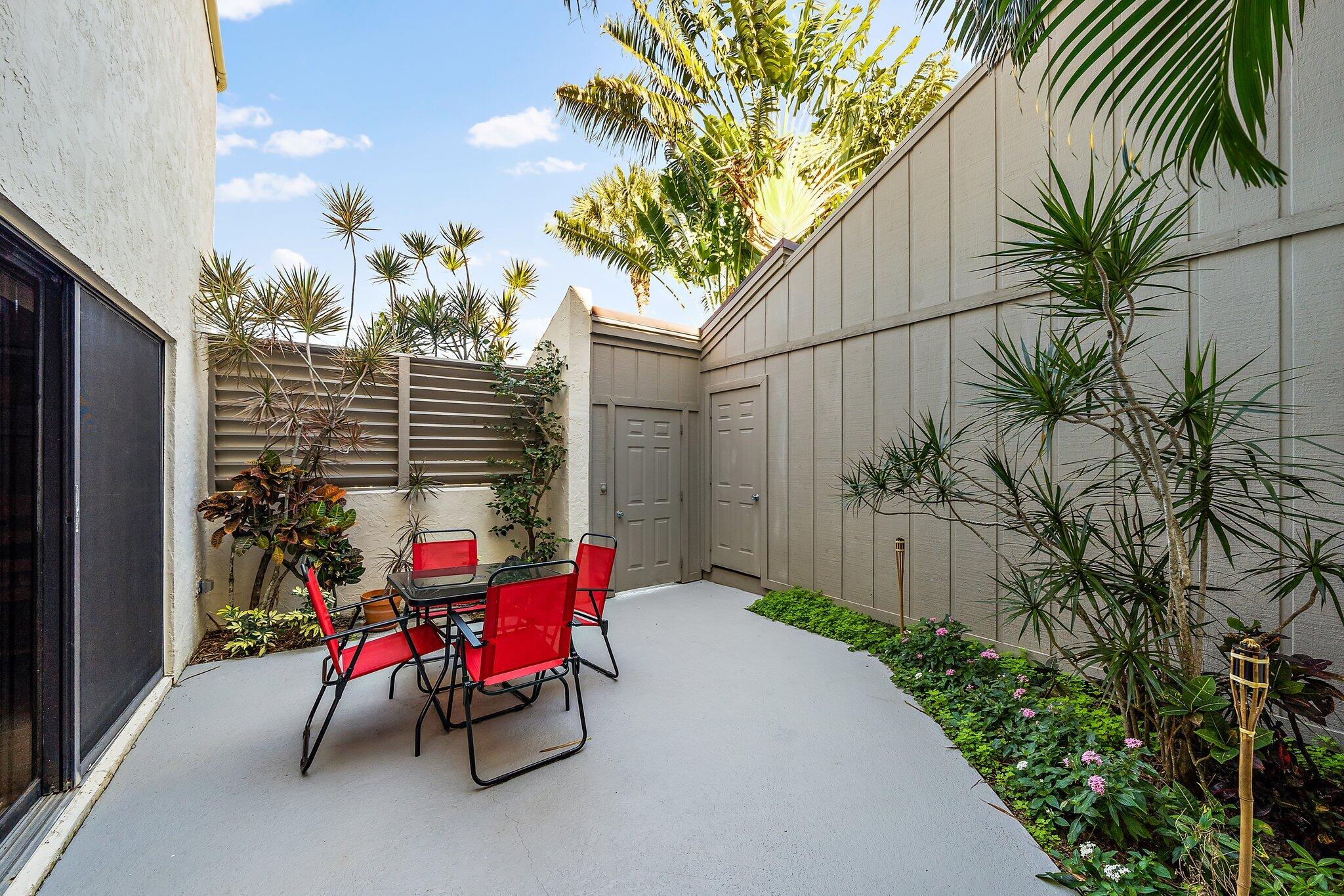 1605 Highway 1, Unit SL5A Jupiter, FL 33477 - Photo 8 of 26 a view of a chairs and table in the patio