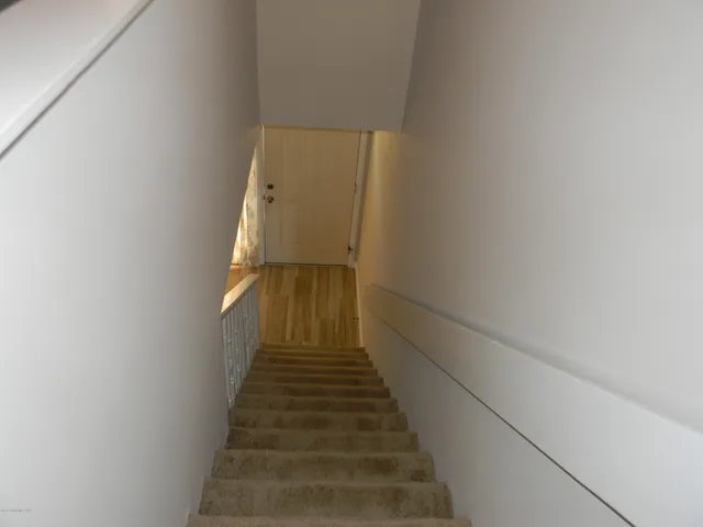 a bathroom with a sink a toilet and a shower