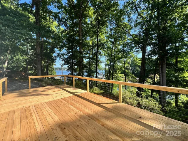a view of swimming pool with trees