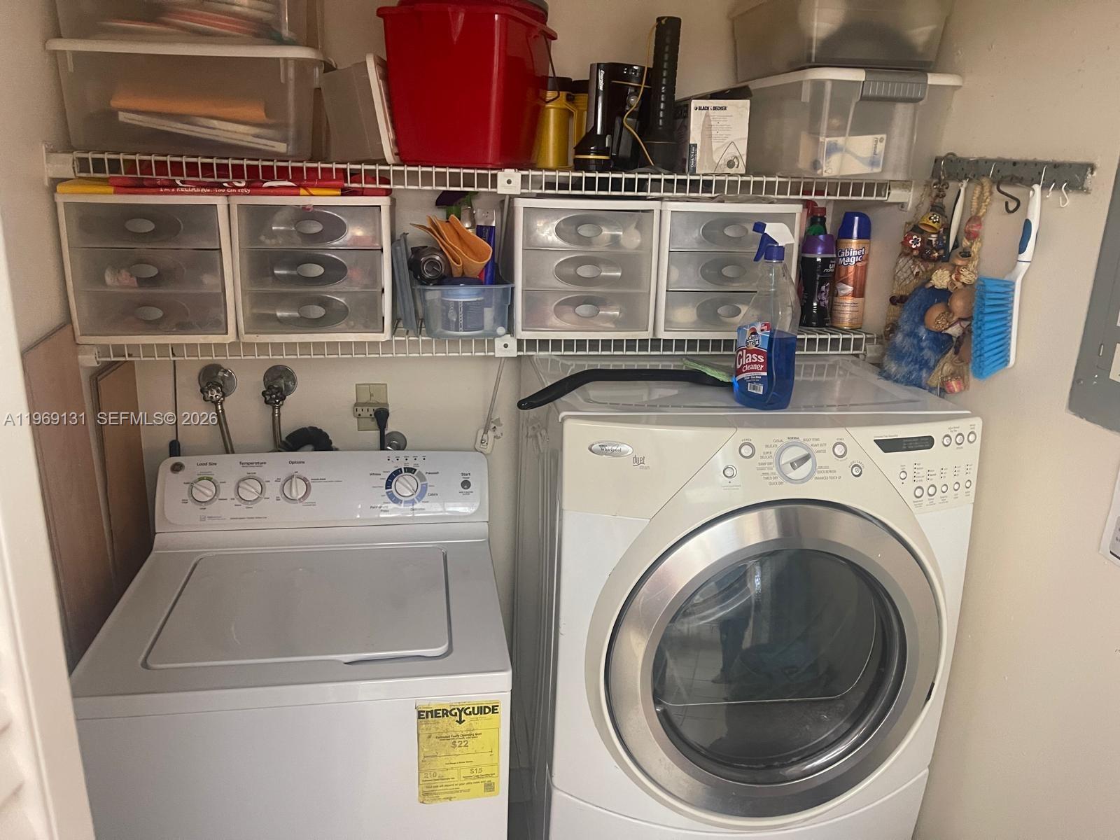 16500 Golf Club Road, Unit 204 Weston, FL 33326 - Photo 16 of 26 a utility room with dryer and washer
