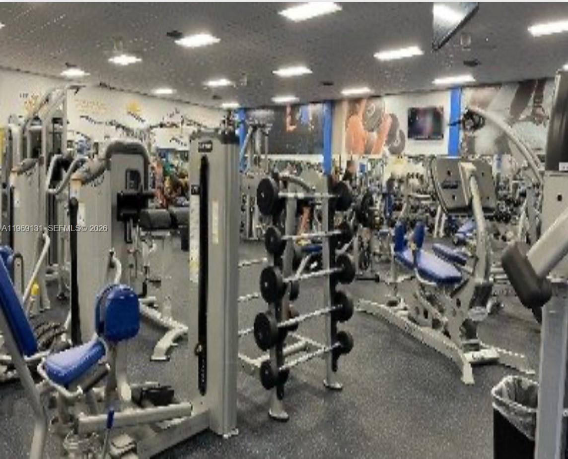 16500 Golf Club Road, Unit 204 Weston, FL 33326 - Photo 22 of 26 a view of a room with gym equipment