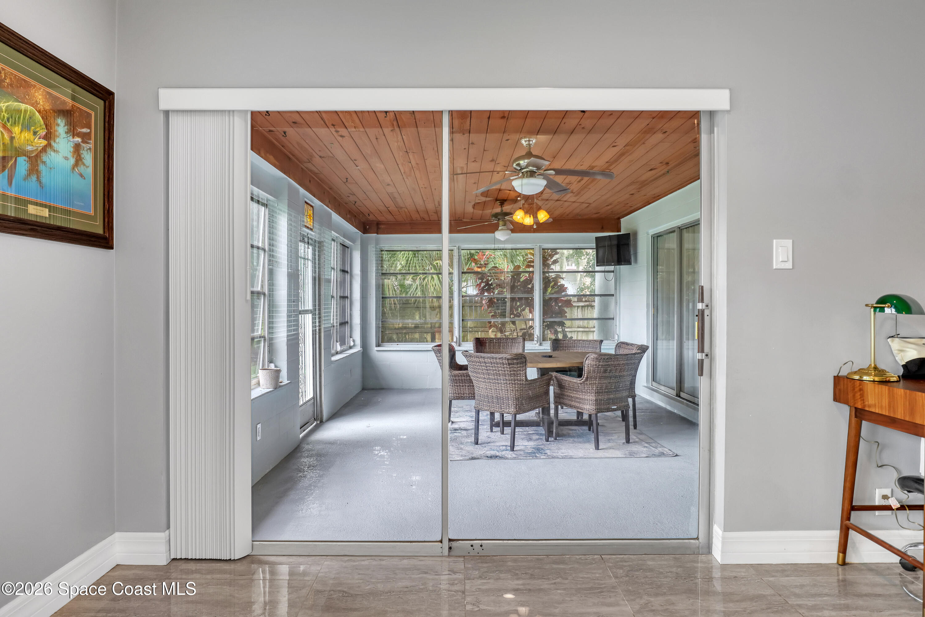 2307 Country Club Road Melbourne, FL 32901 - Photo 25 of 44 a view of a livingroom with furniture and window