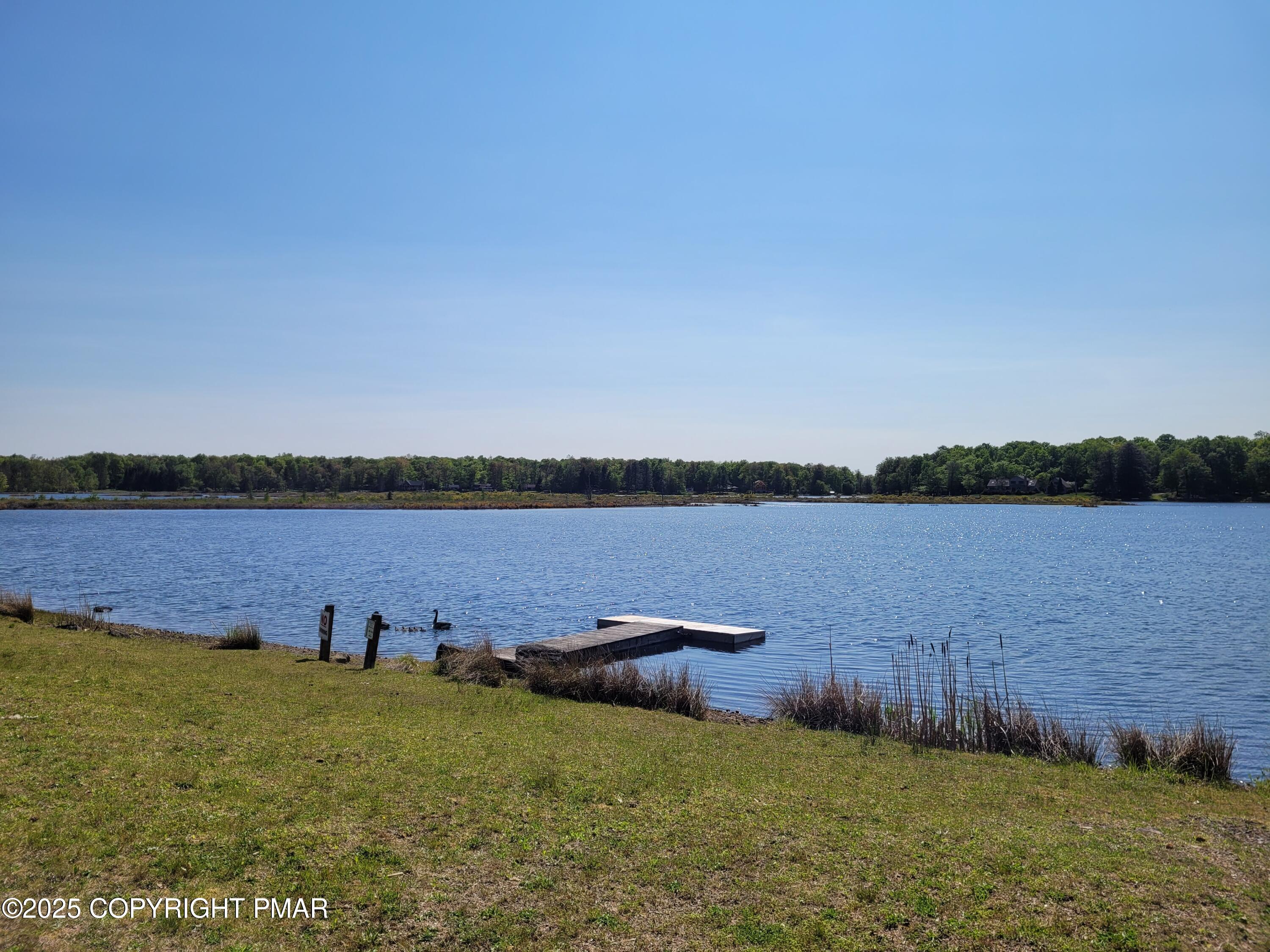 51 Middle Ridge Drive Newfoundland, PA 18445 - Photo 14 of 33 a view of a lake from a yard