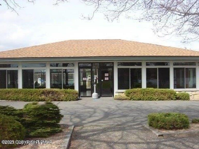 51 Middle Ridge Drive Newfoundland, PA 18445 - Photo 2 of 33 front view of a brick house with a yard