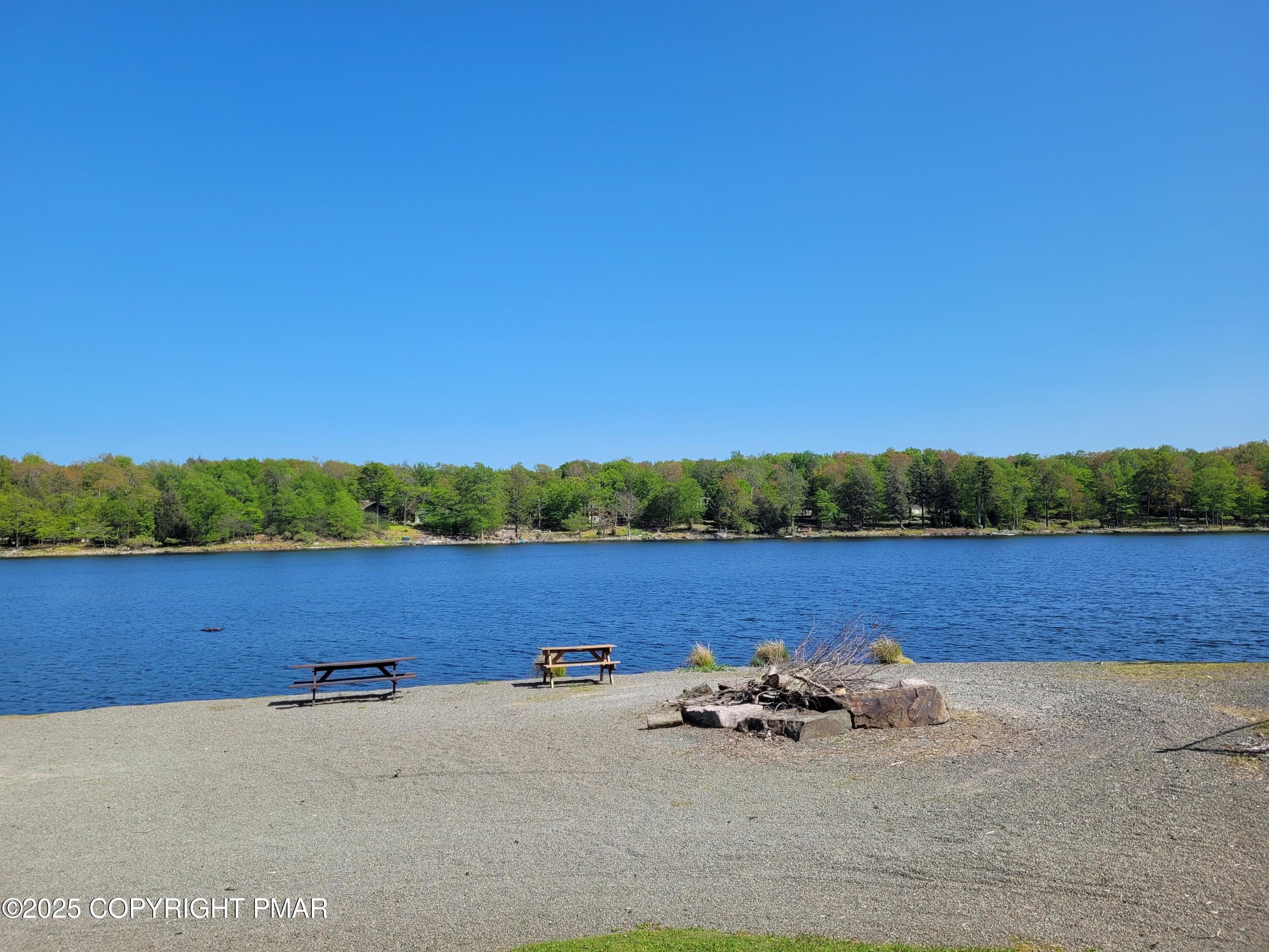 51 Middle Ridge Drive Newfoundland, PA 18445 - Photo 24 of 33 a view of a lake with houses in the back