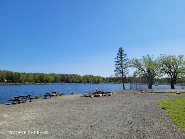 a view of patio and a yard