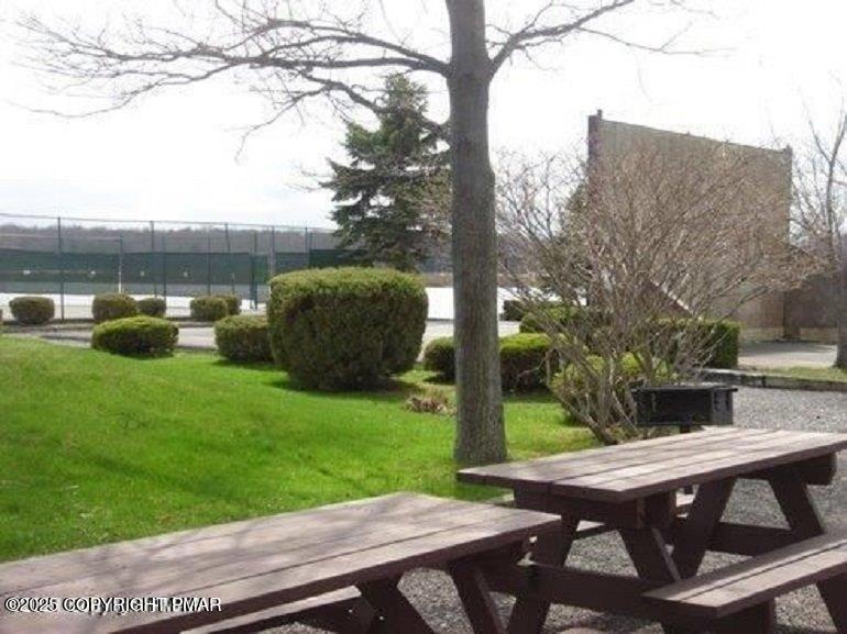 51 Middle Ridge Drive Newfoundland, PA 18445 - Photo 4 of 33 a view of backyard with seating area and green space