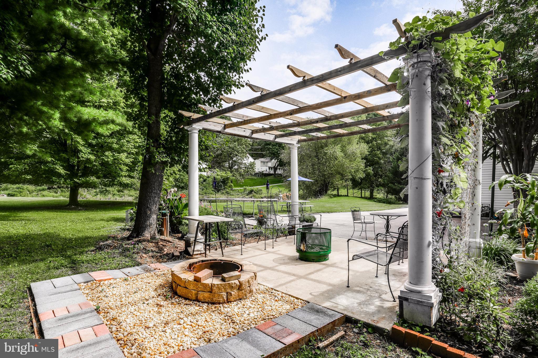 11946 Frederick Road Ellicott City, MD 21042 - Photo 28 of 30 Enjoy the warm fire pit in cool Autumn evening