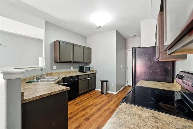 a bathroom with a sink toilet and a mirror