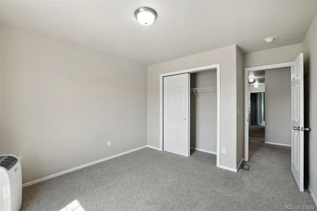 a bathroom with a sink toilet mirror and shower