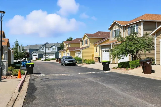 a view of a street with cars