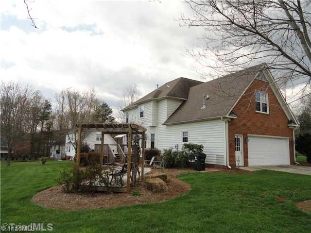 6801 Danbers Court Oak Ridge, NC 27310 - Photo 2 of 16 Exterior Back.