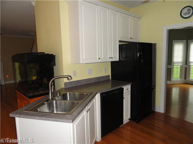 6801 Danbers Court Oak Ridge, NC 27310 - Photo 15 of 16 Kitchen.