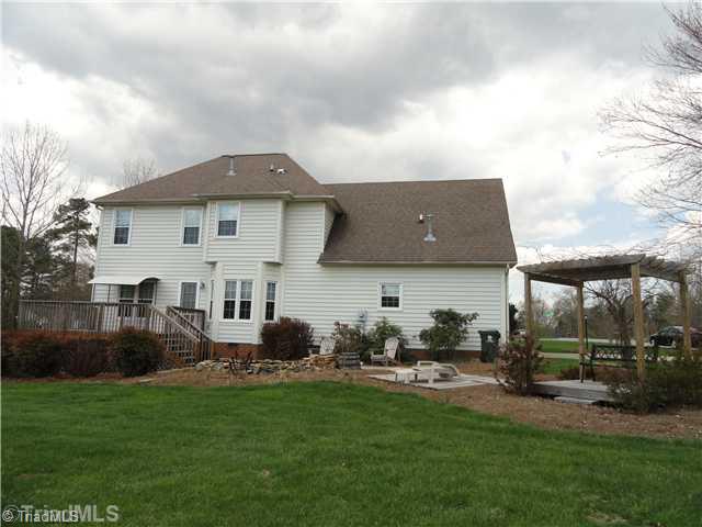 6801 Danbers Court Oak Ridge, NC 27310 - Photo 3 of 16 Exterior Back.