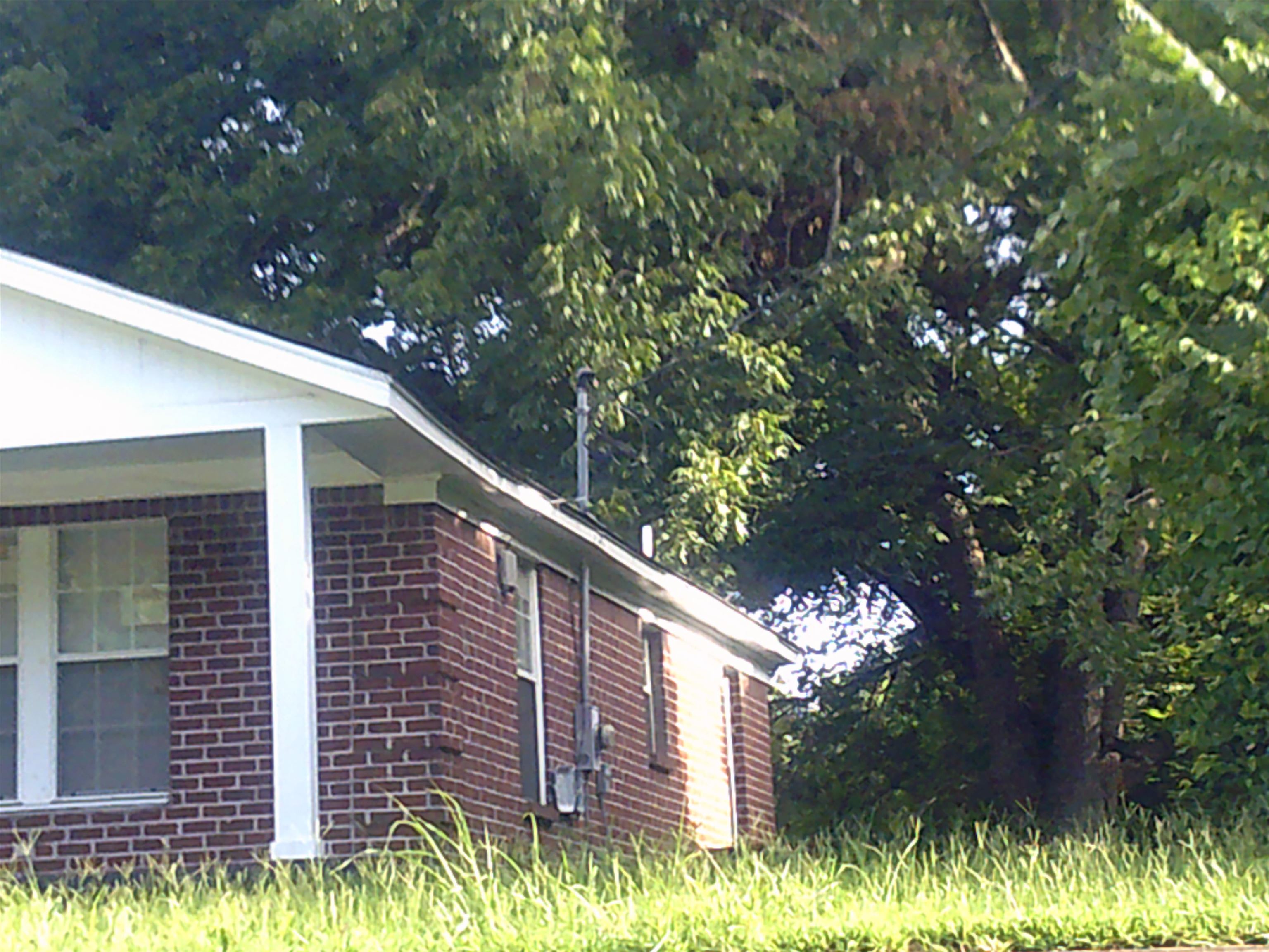 783 Nonconnah Road Memphis, TN 38109 - Photo 3 of 11 a view of a house with a tree