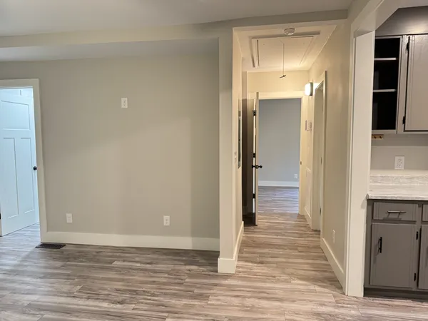 a view of a bathroom from the hallway