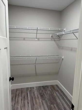 a view of a room with racks on the wall