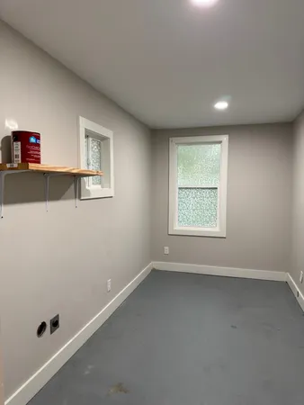 an empty room with a window