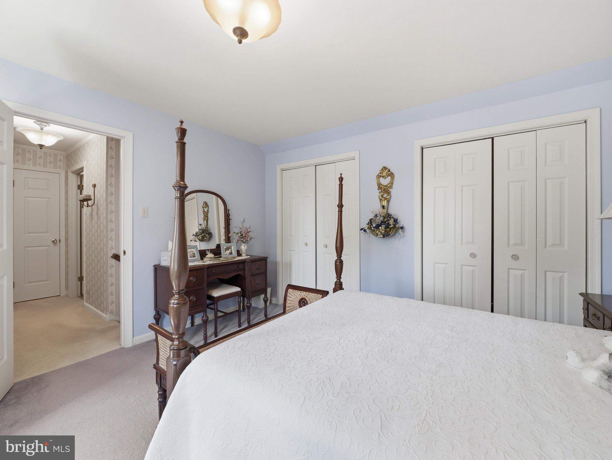 2606 Ridge Road South Martinsburg, WV 25403 - Photo 32 of 57 Charming bedroom with soft blue hues.