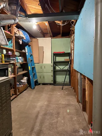 a view of an empty room with stairs