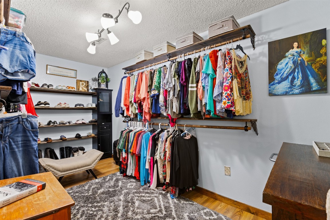 10960 McDowell Road Conroe, TX 77306 - Photo 16 of 25 A walk in closet you've been dreaming of in the primary bedroom.