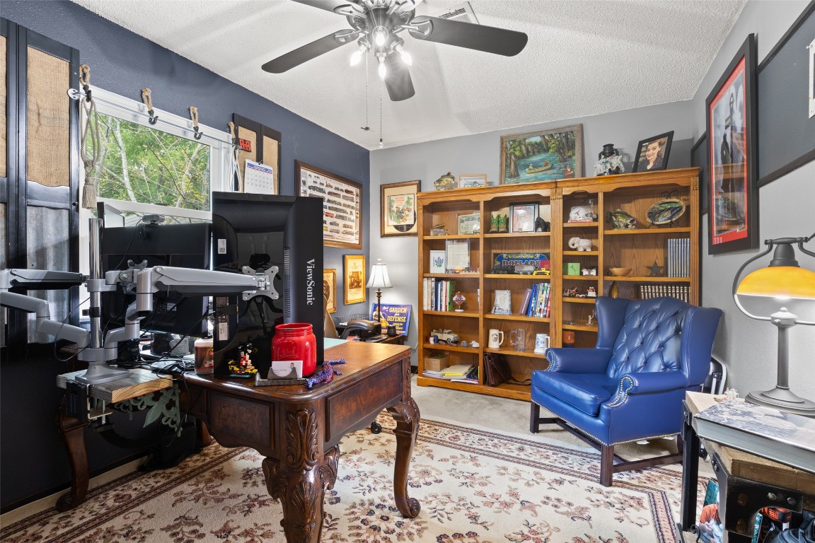 10960 McDowell Road Conroe, TX 77306 - Photo 19 of 25 Flexible space with natural light—perfect for work-from-home or guest use.