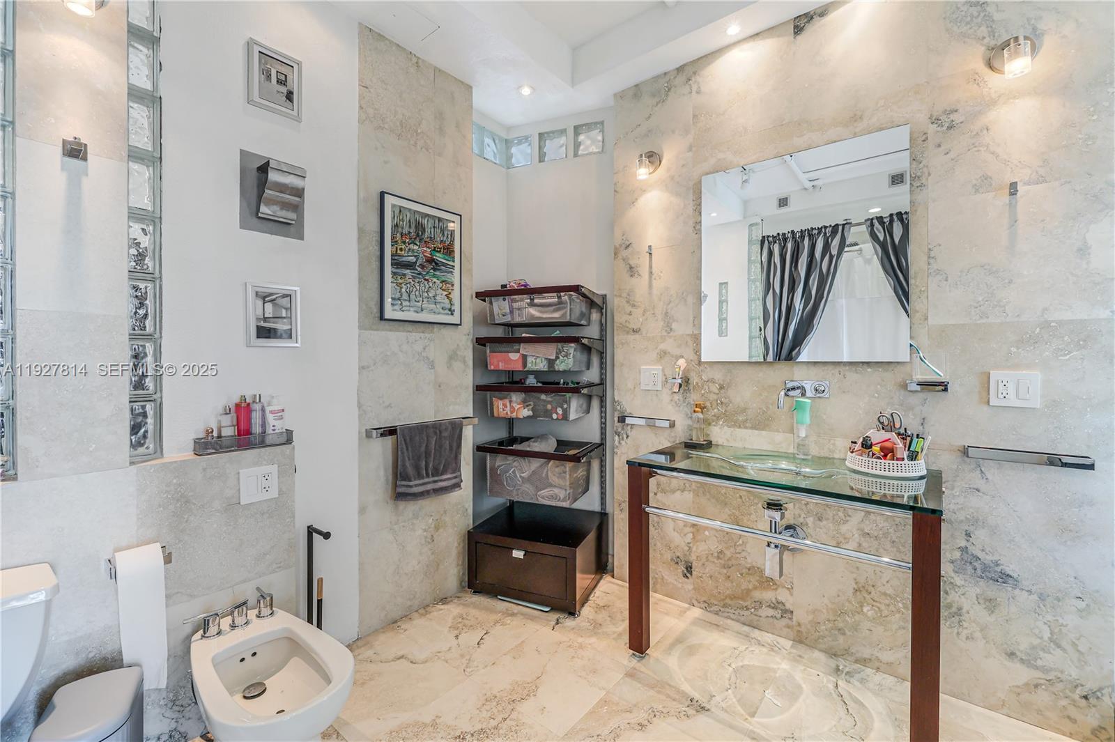 3180 Southwest 22nd Terrace, Unit PH201 Miami, FL 33145 - Photo 17 of 58 a kitchen with a cabinets and a stove