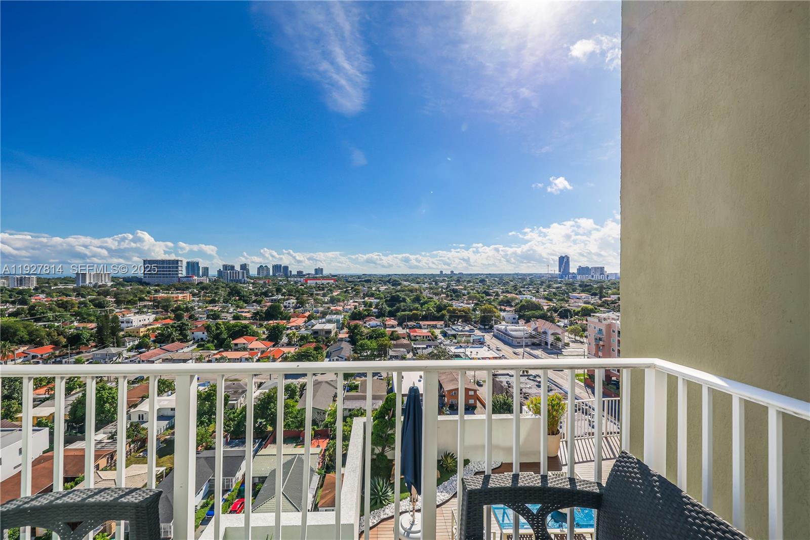3180 Southwest 22nd Terrace, Unit PH201 Miami, FL 33145 - Photo 34 of 58 a view of a city from a roof deck